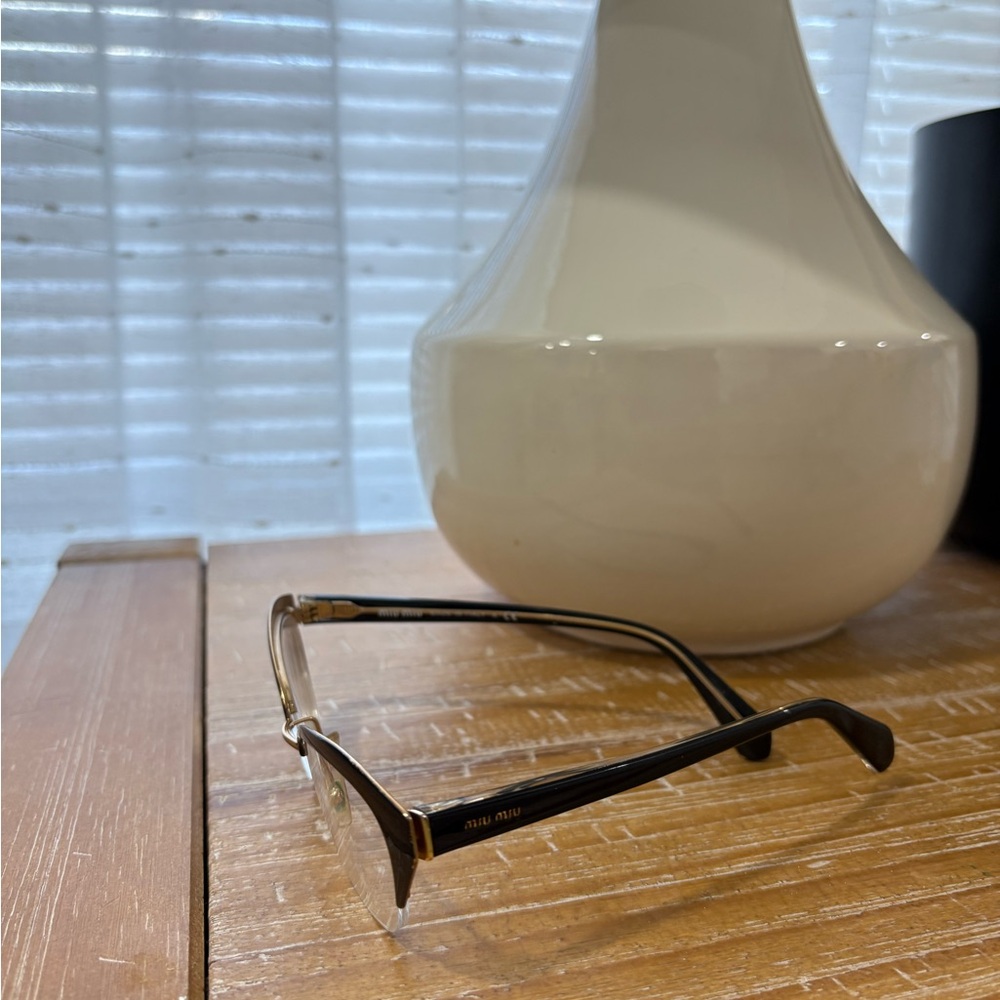 Miu Miu Black and Gold Glasses